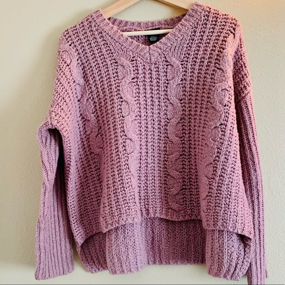 Pink knitted sweater